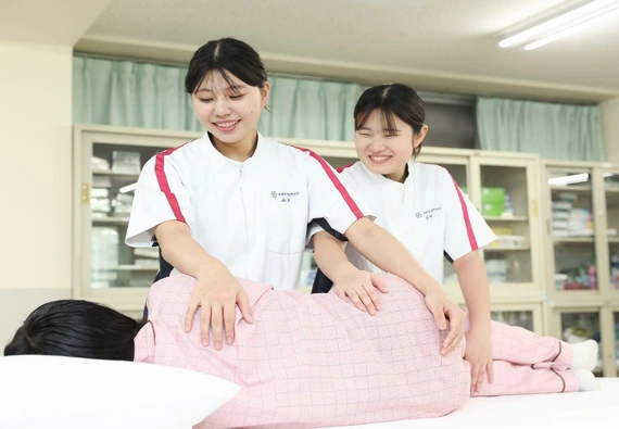 Nursing students practicing patient positioning techniques at Ideal Institute of Nursing