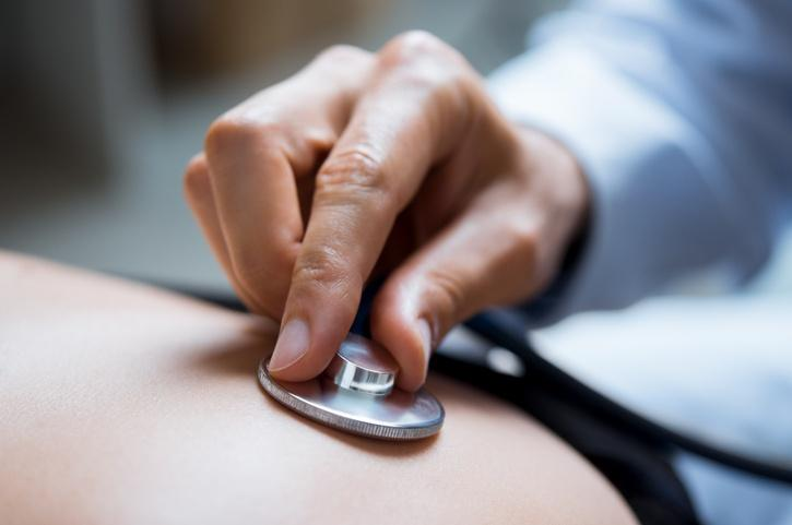 Close-up of lung auscultation during a clinical respiratory examination