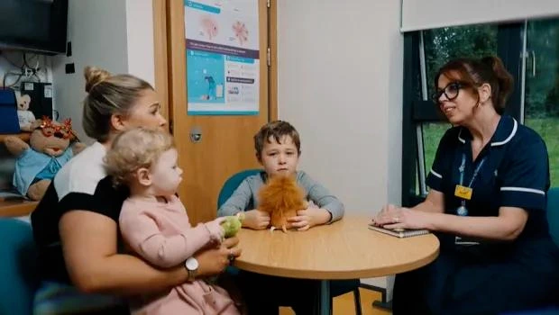 Nursing student educating family members about seizure first aid and home management